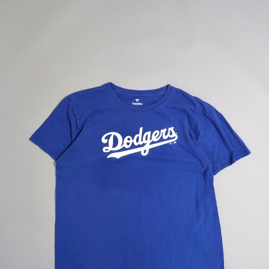 Blue T-shirt with nullDodgersnull in white script lettering.