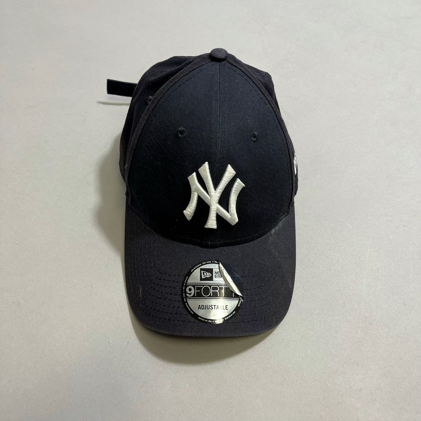 NY cap