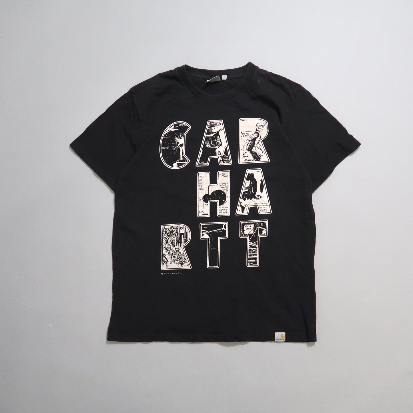 Black T-shirt with nullCARHARTTnull in illustrated letters.