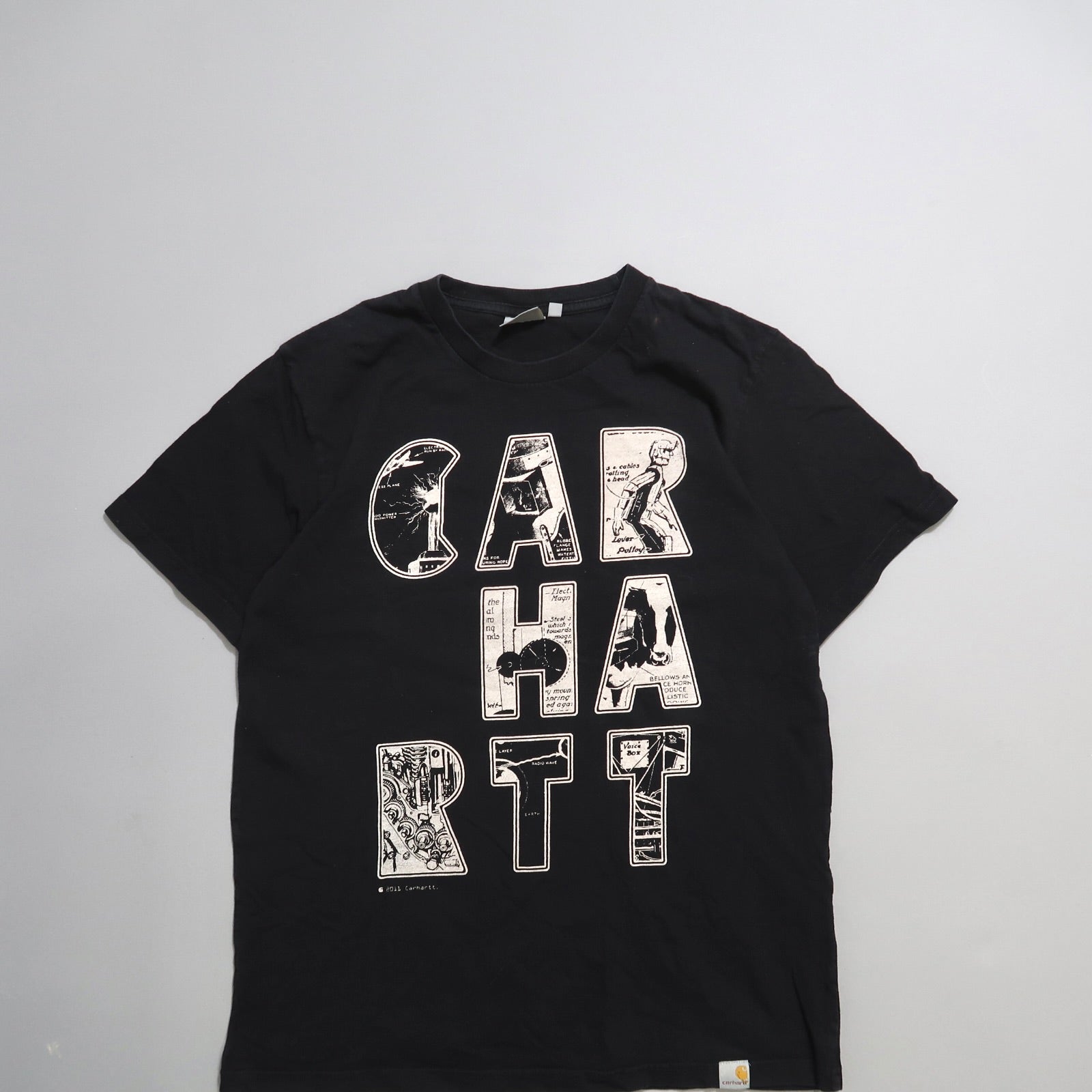 Black T-shirt with nullCARHARTTnull in graphic-style lettering.