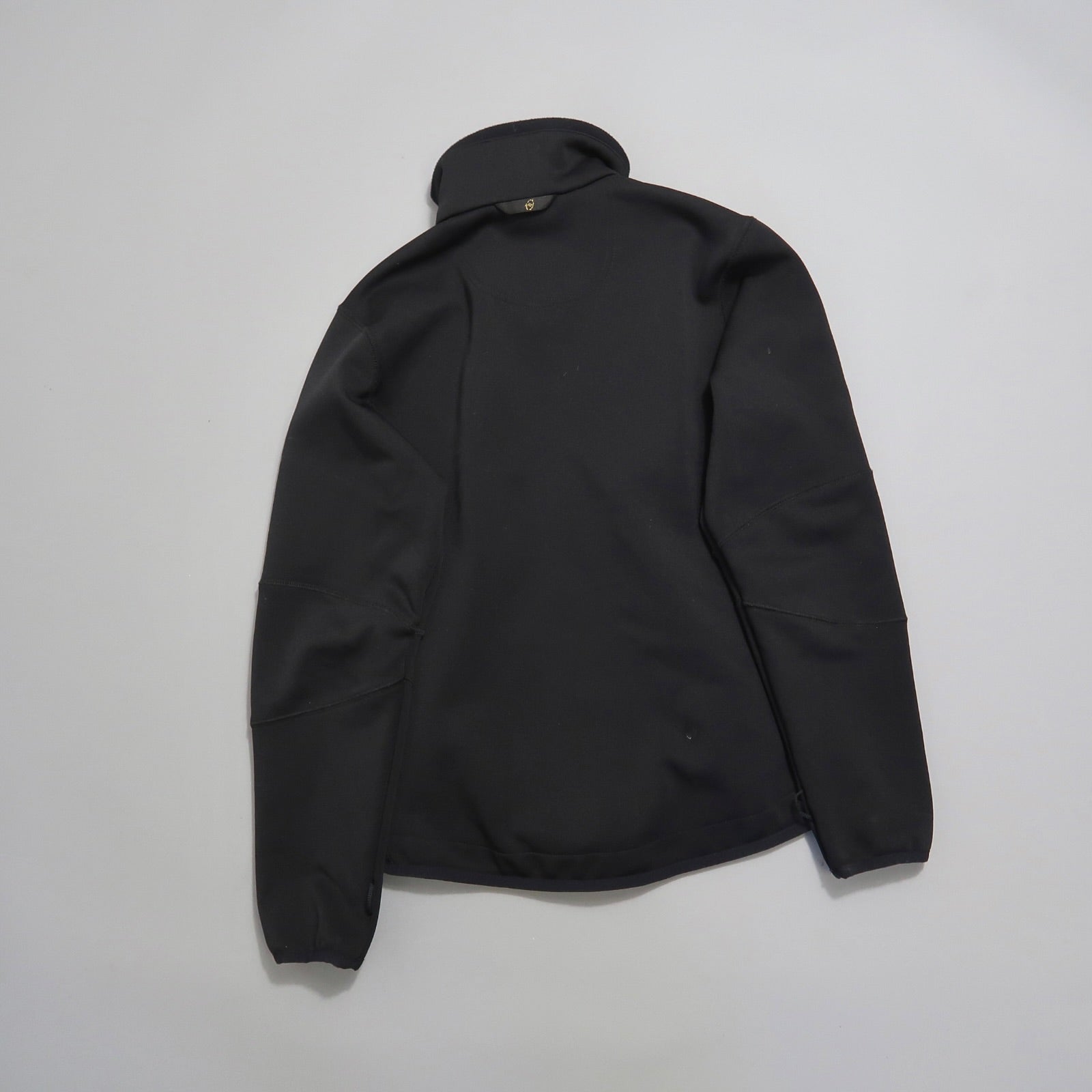 Black jacket displayed flat against a plain background.