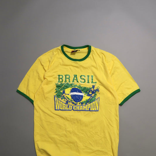 Yellow Brazil World Champion t-shirt with green trim.