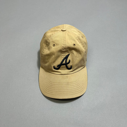 Tan baseball cap with a black nullAnull logo on the front.